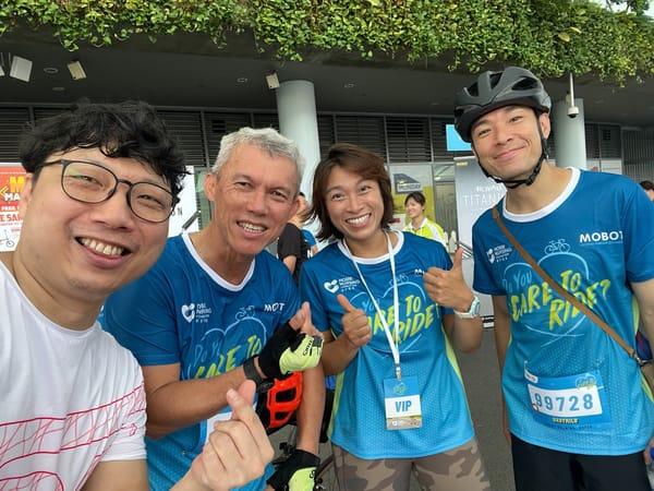 Tour de Care 2024 participants together in their blue event jerseys
